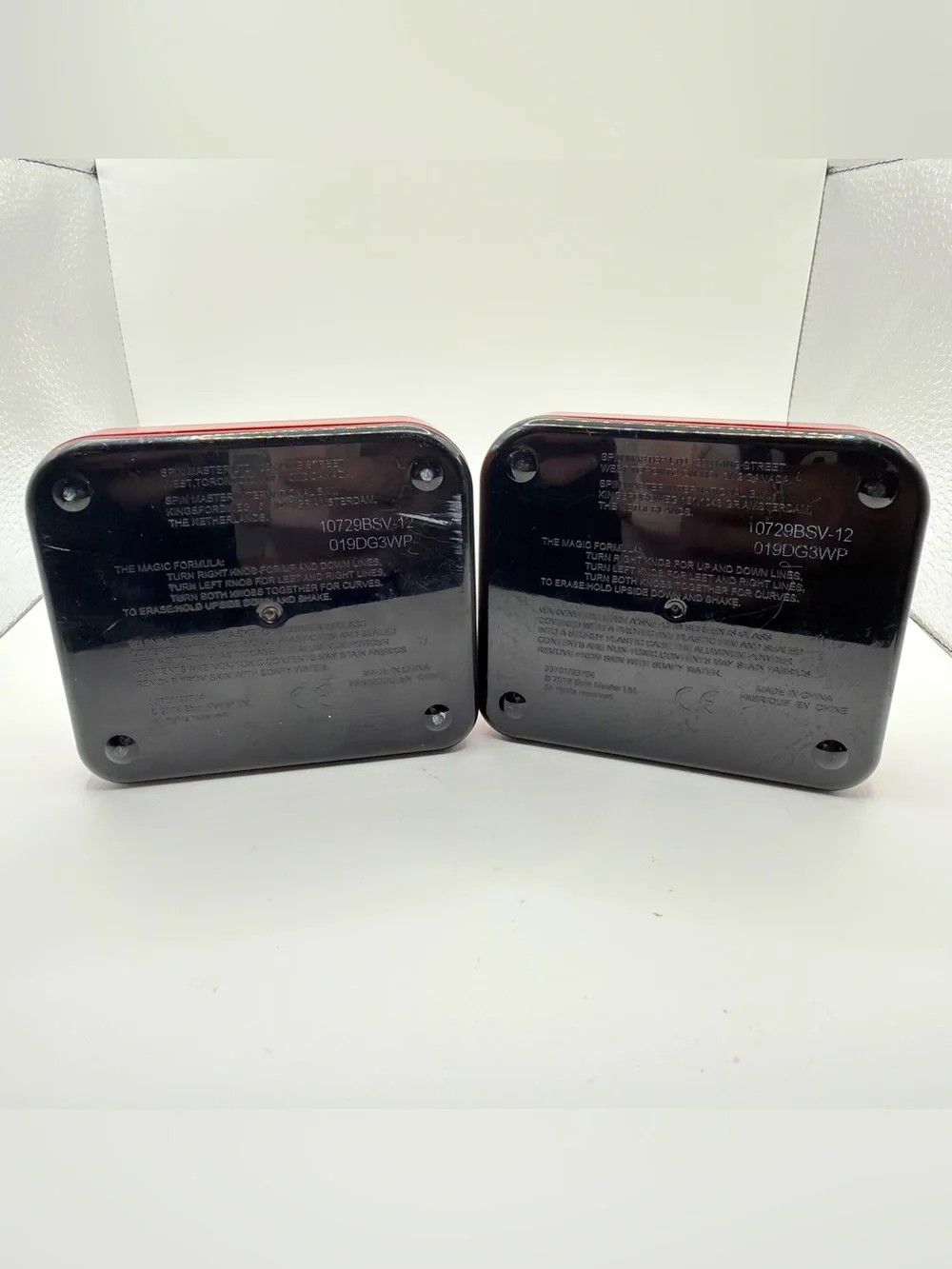 Pair of Mini Classic Red etch a Sketch toys